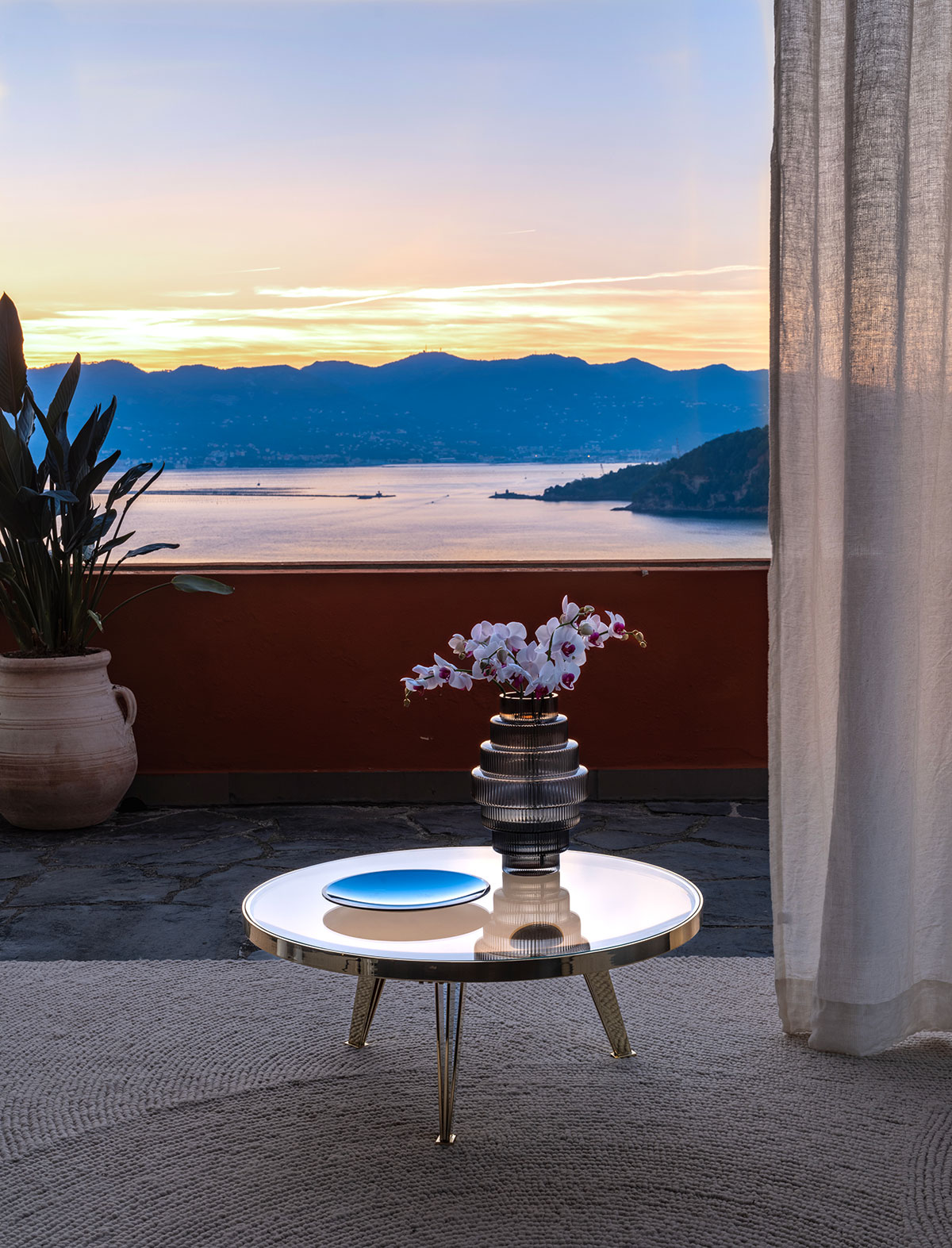 Gaspare Asaro Riflesso table in a Mediterranean villa.